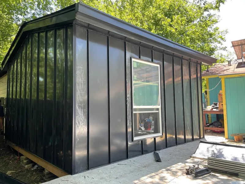 Black standing seam metal wall panels for Metal Roof Installation in Canfield